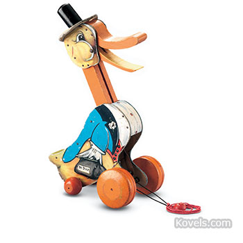 Dr. Doodle, 1931. Pull toy, paper on wood. $176 - $1,708. (Fisher-Price)