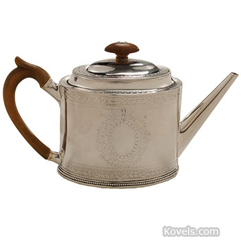 Sterling Silver Teapot With Heraldic Design