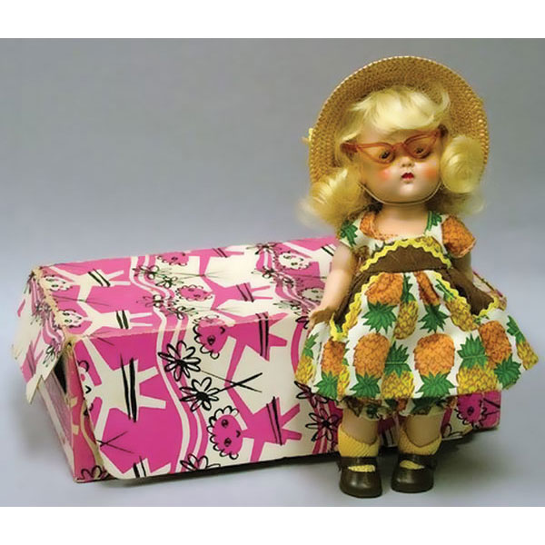 Ginny is wearing a pineapple print cotton sundress in the latest style. She has matching underpants, a straw hat, and plastic sunglasses. The box is original. No question about this 1952 doll. She is marked Vogue on the head, body, and shoes.