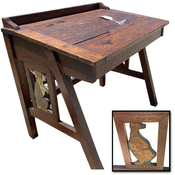 Vintage desk with carved rabbit and duck