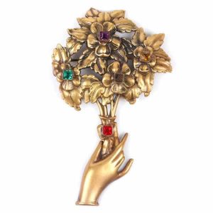 joseff of hollywood brooch pin jewelry hand holding bouquet of flowers