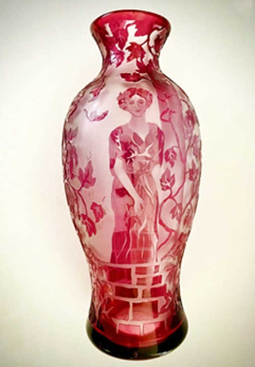 Need help identifying red glass vase makers mark Kovels